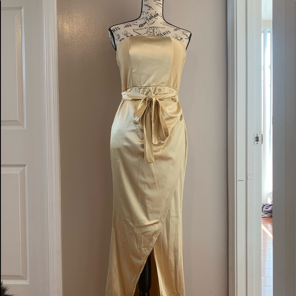 Gold silk floor length strapless dress with slit